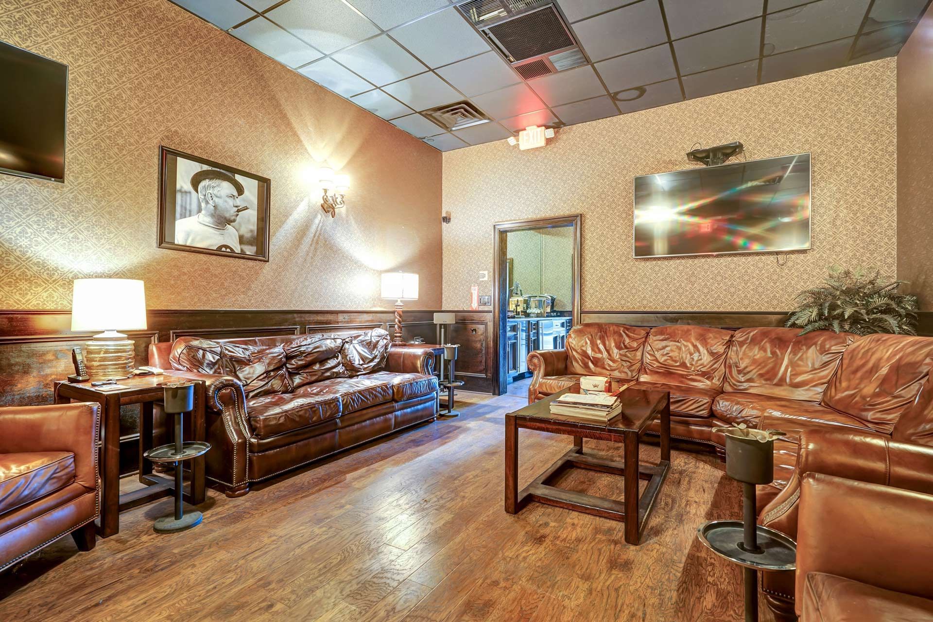 A living room filled with furniture and a television