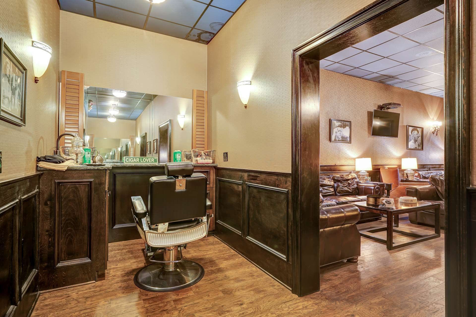 A barber chair in the middle of the room