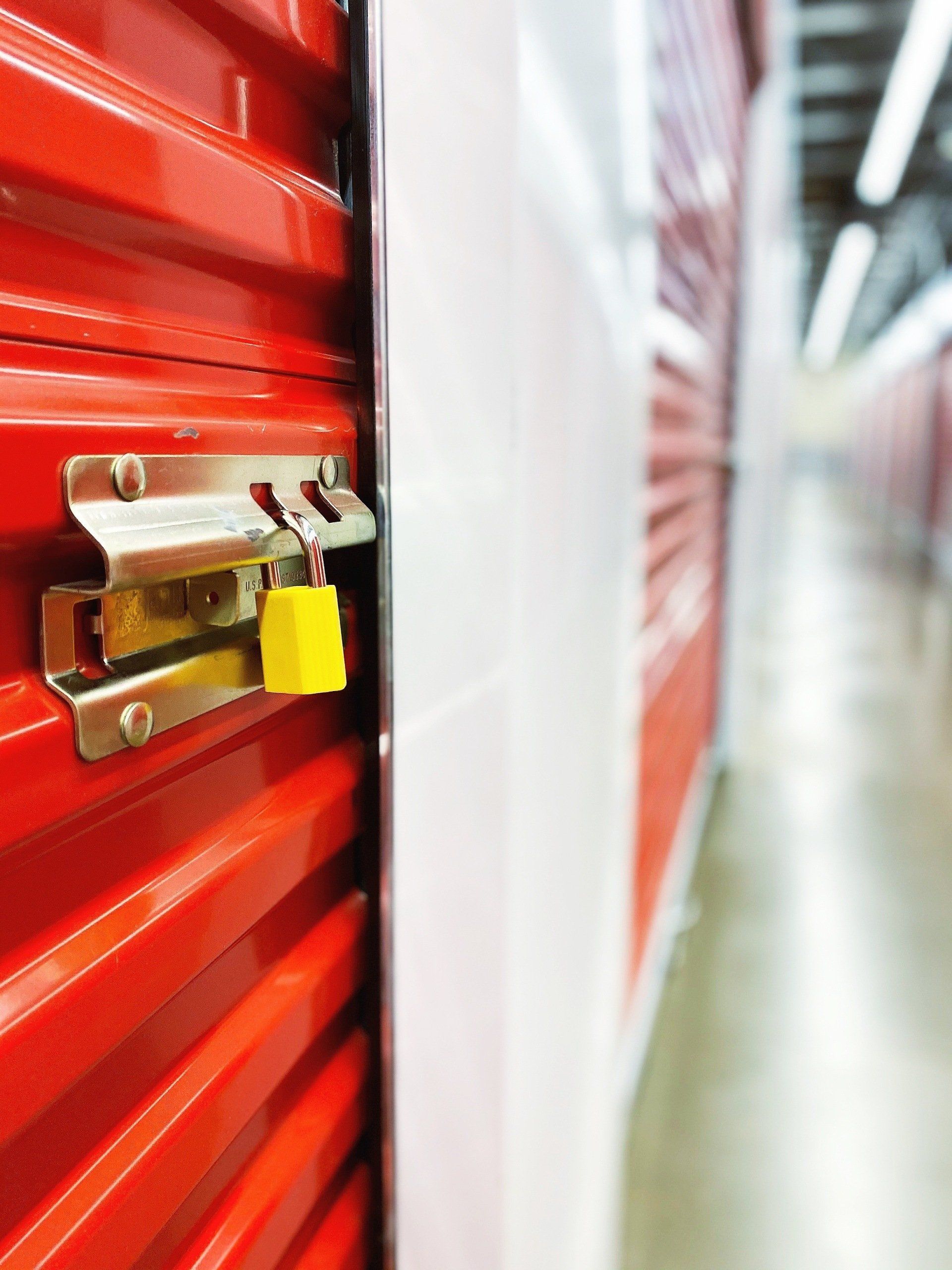 red storage unit door with yellow lock