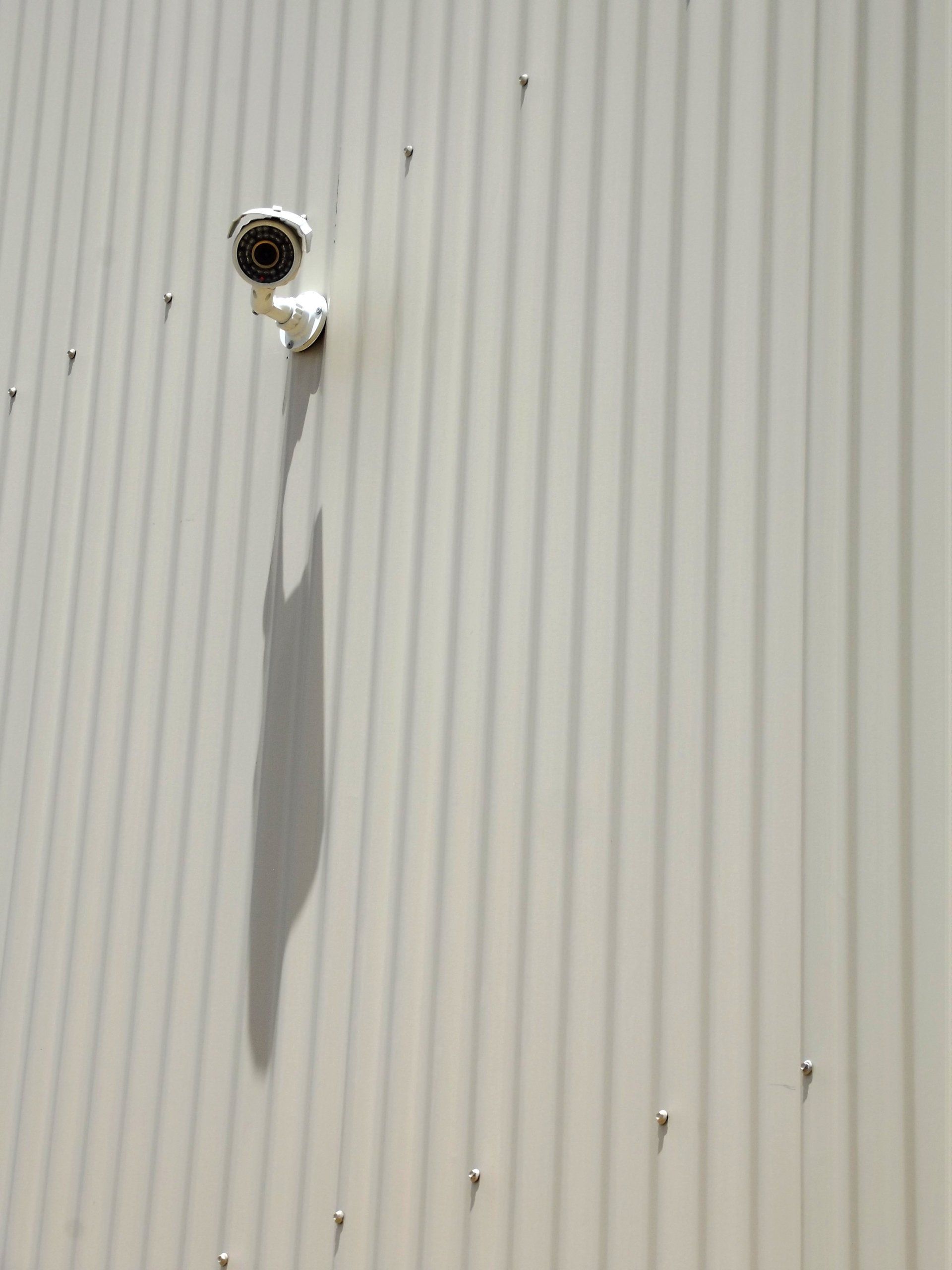 security camera on wall