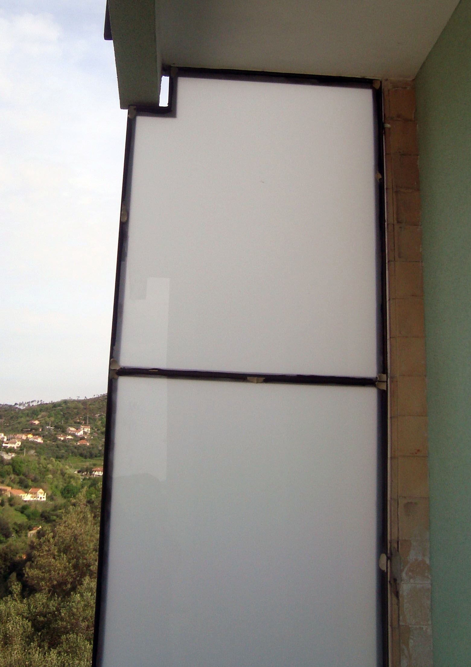 Divisorio terrazzo in vetro