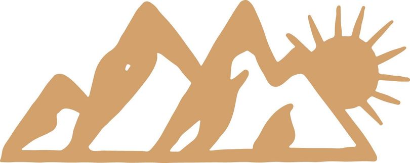 Tan silhouette of mountains and a sun.