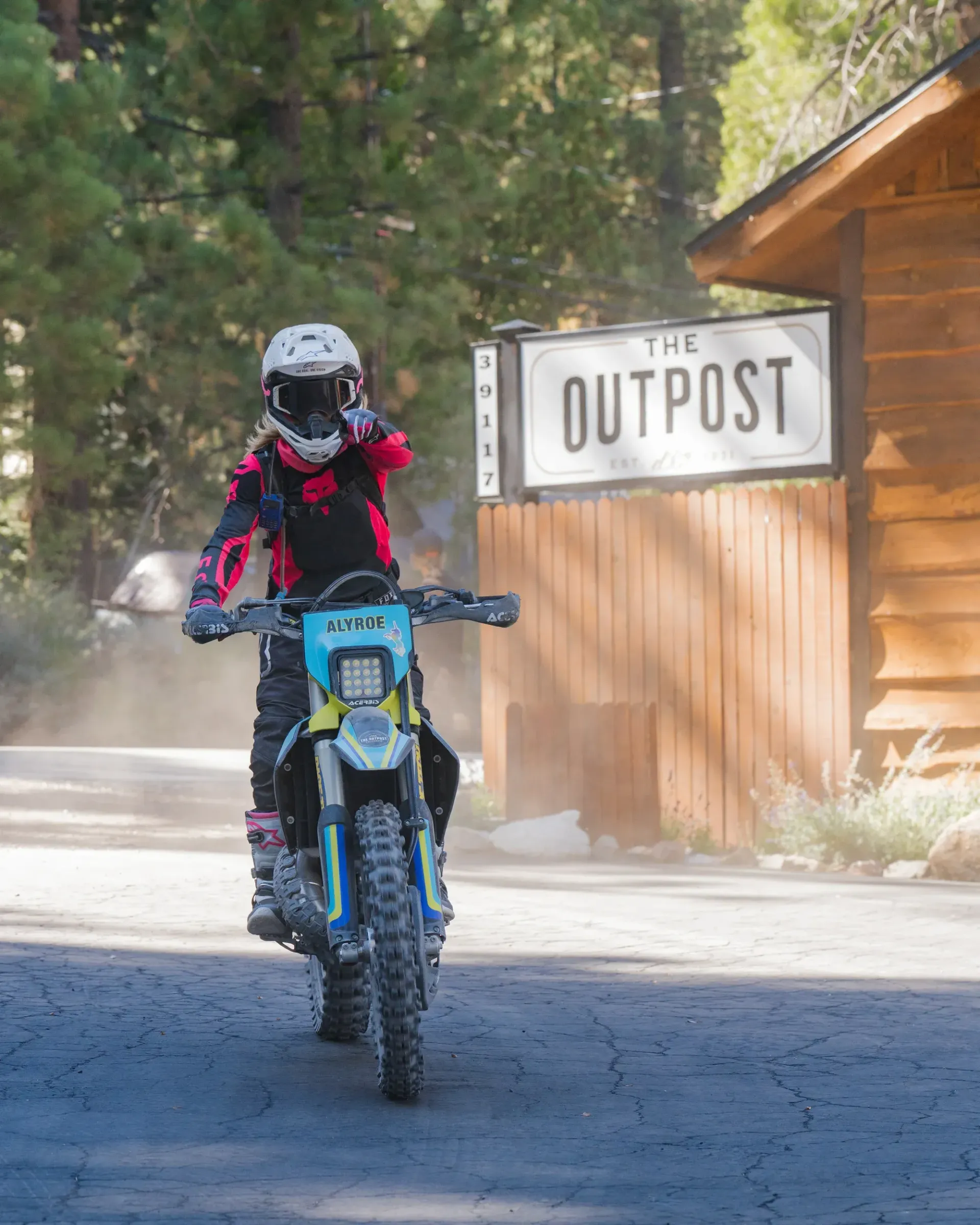 Person on dirt bike in front of 