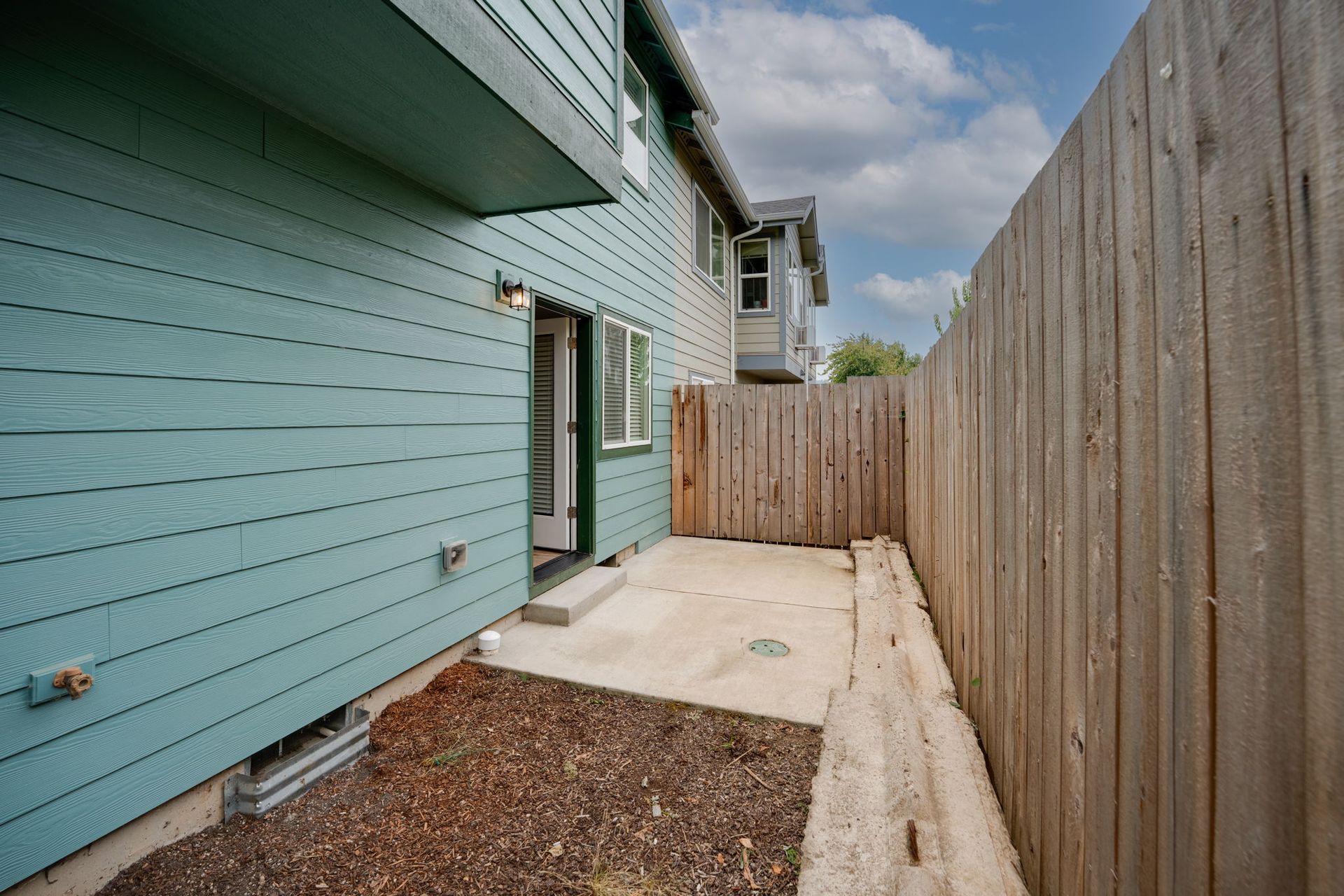 back patio with view of door to bedroom