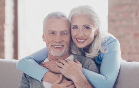 Dental Implants — Two Happy Old Married People with Shiny White Smiles in Lafayette, IN