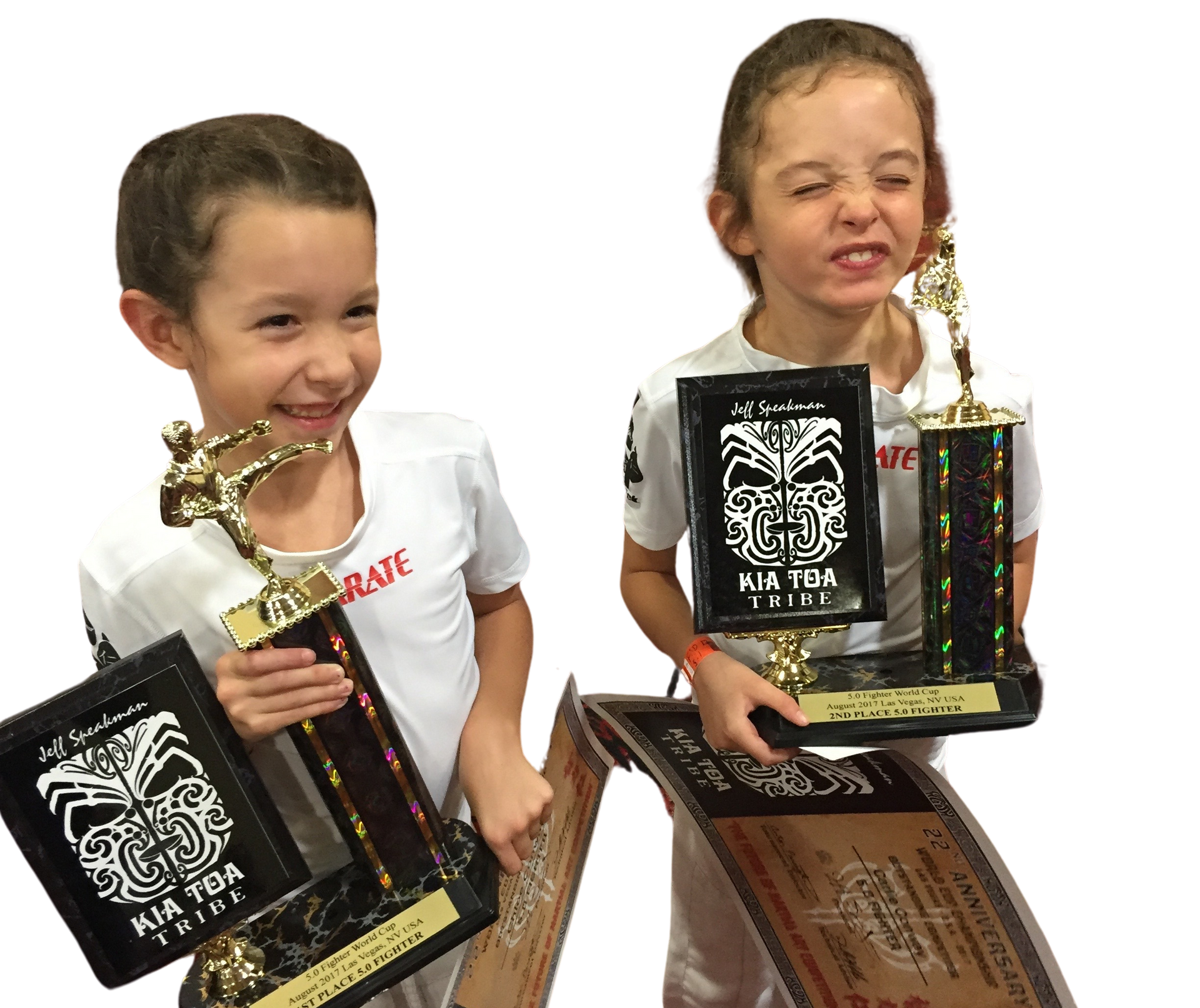 A boy and a girl are practicing karate together.