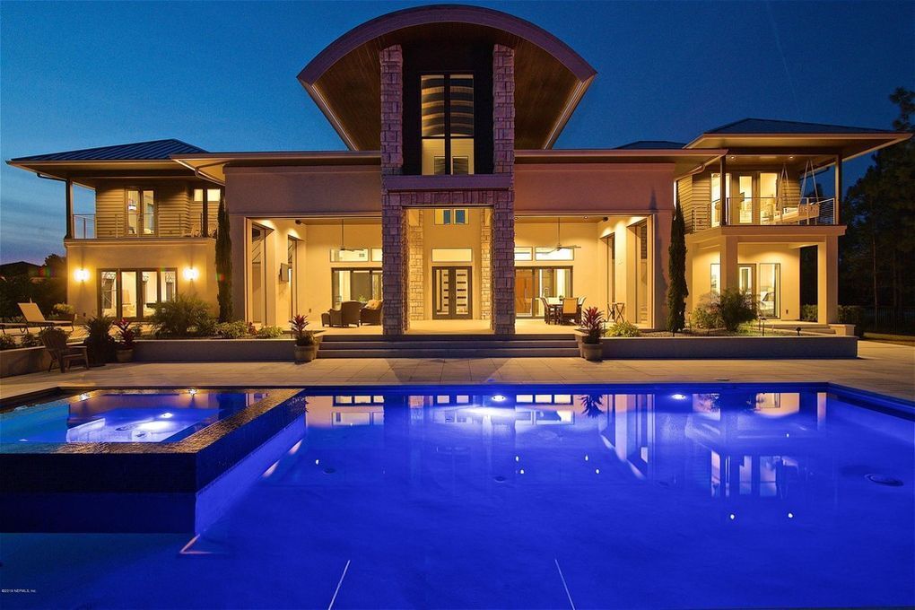 A large house with a swimming pool in front of it — Jacksonville, FL — Stonecore
