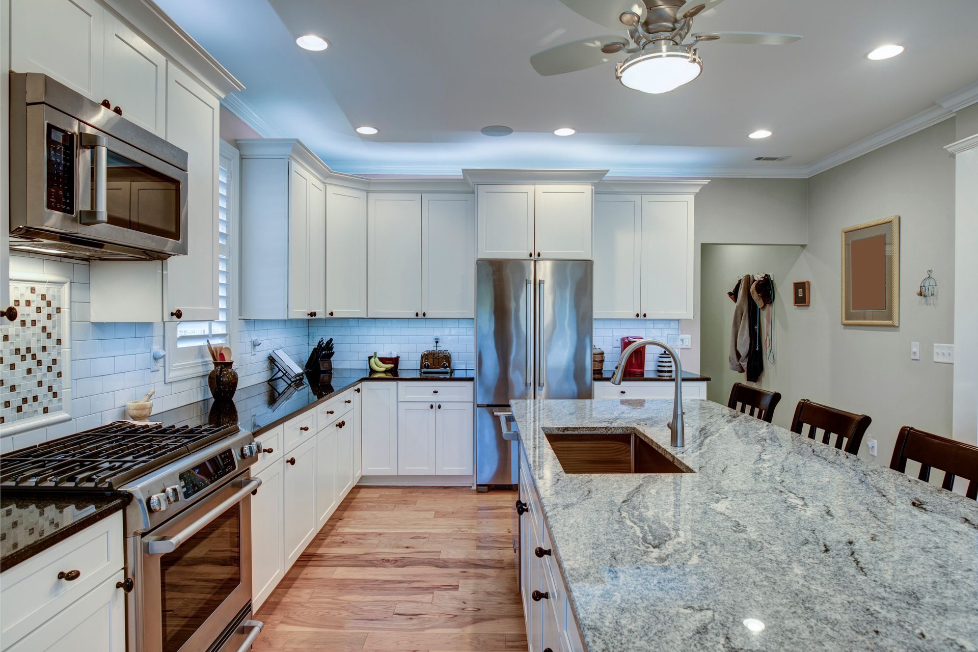 A kitchen with a quartz countertop.