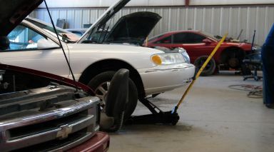 Repairing Vehicles in Garage | Strickland Automotive Repair Inc.
