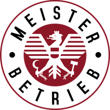 Ein Meister Betrieb Logo mit einem Adler in der Mitte