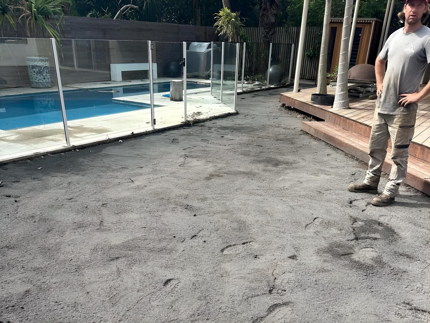 A Man is Standing in Front of a Swimming Pool — Limited Access Excavation In Alstonville, NSW