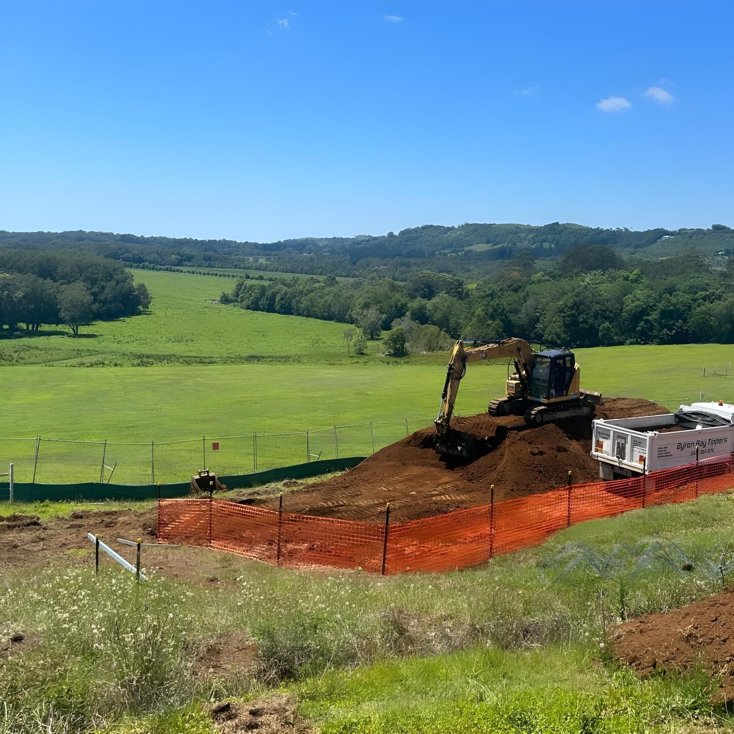 A Bulldozer is Working on a Pile of Dirt in a Field — Limited Access Excavation In Casino, NSW