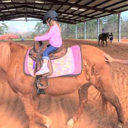 A Western horseback riding lesson in Nacogdoches TX at Pine Top Stables and Grounds