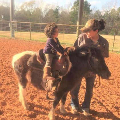A Western horseback riding lesson in Nacogdoches TX at Pine Top Stables and Grounds