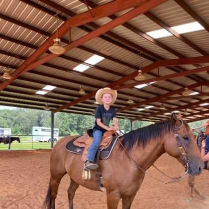A Western horseback riding lesson in Nacogdoches TX at Pine Top Stables and Grounds