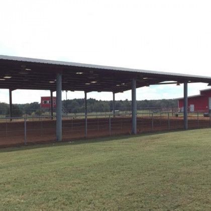 A covered riding arena in Nacogdoches TX at Pine Top Stables and Grounds