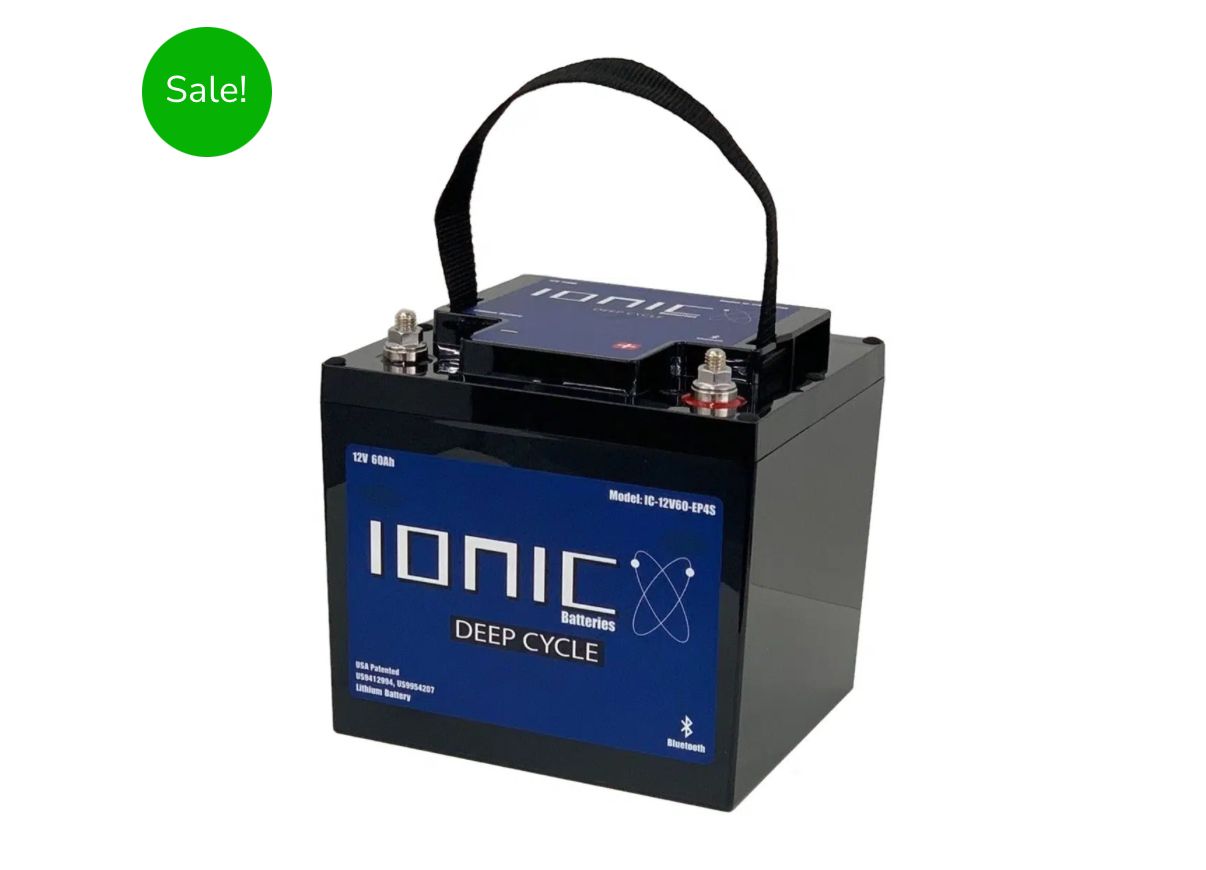 Waves of blue water, with white foam and golden highlights, creating a dynamic, fluid scene.