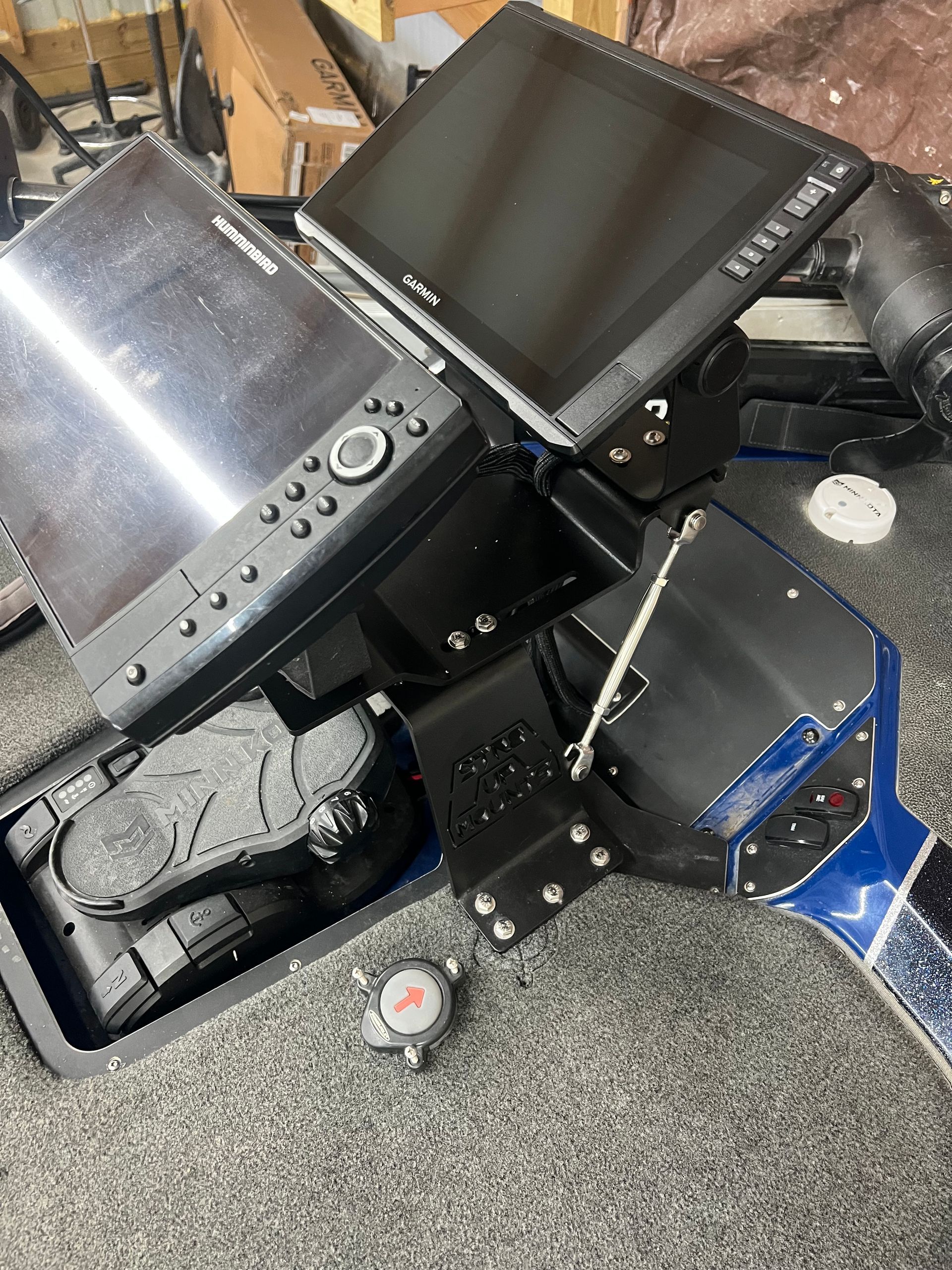 Fishing boat electronics: two displays, foot pedal, mounting hardware, and cables.