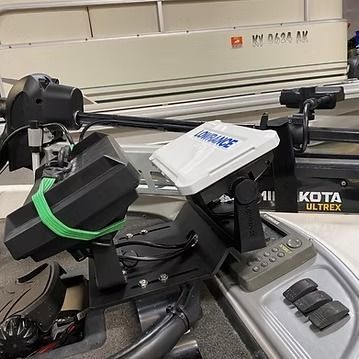 Waves of blue water, with white foam and golden highlights, creating a dynamic, fluid scene.