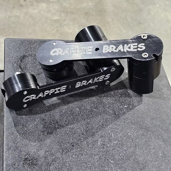 Waves of blue water, with white foam and golden highlights, creating a dynamic, fluid scene.