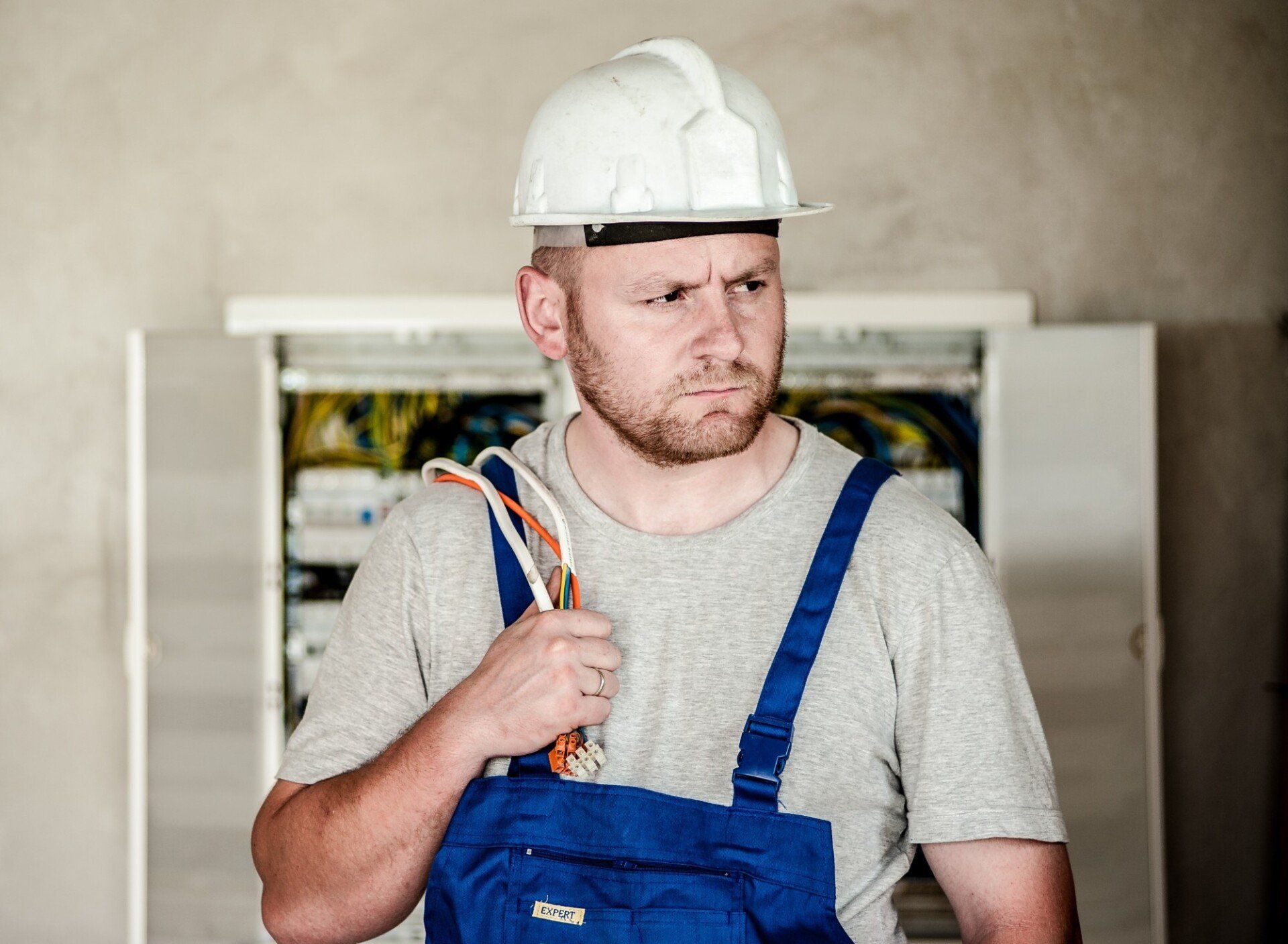 man in hard hat and overalls