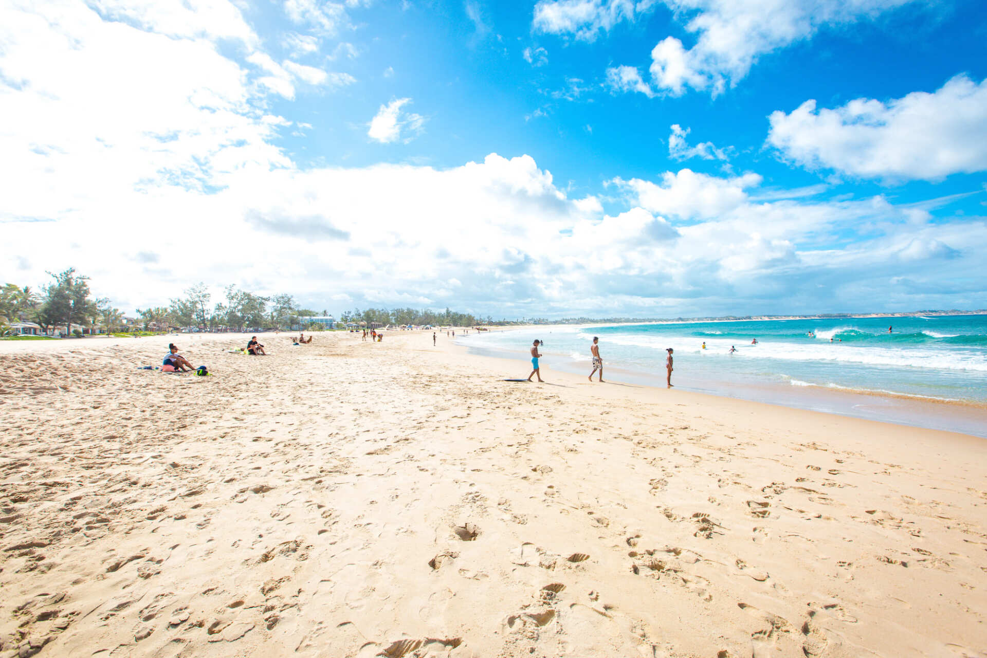 people relaxing on tofo beach