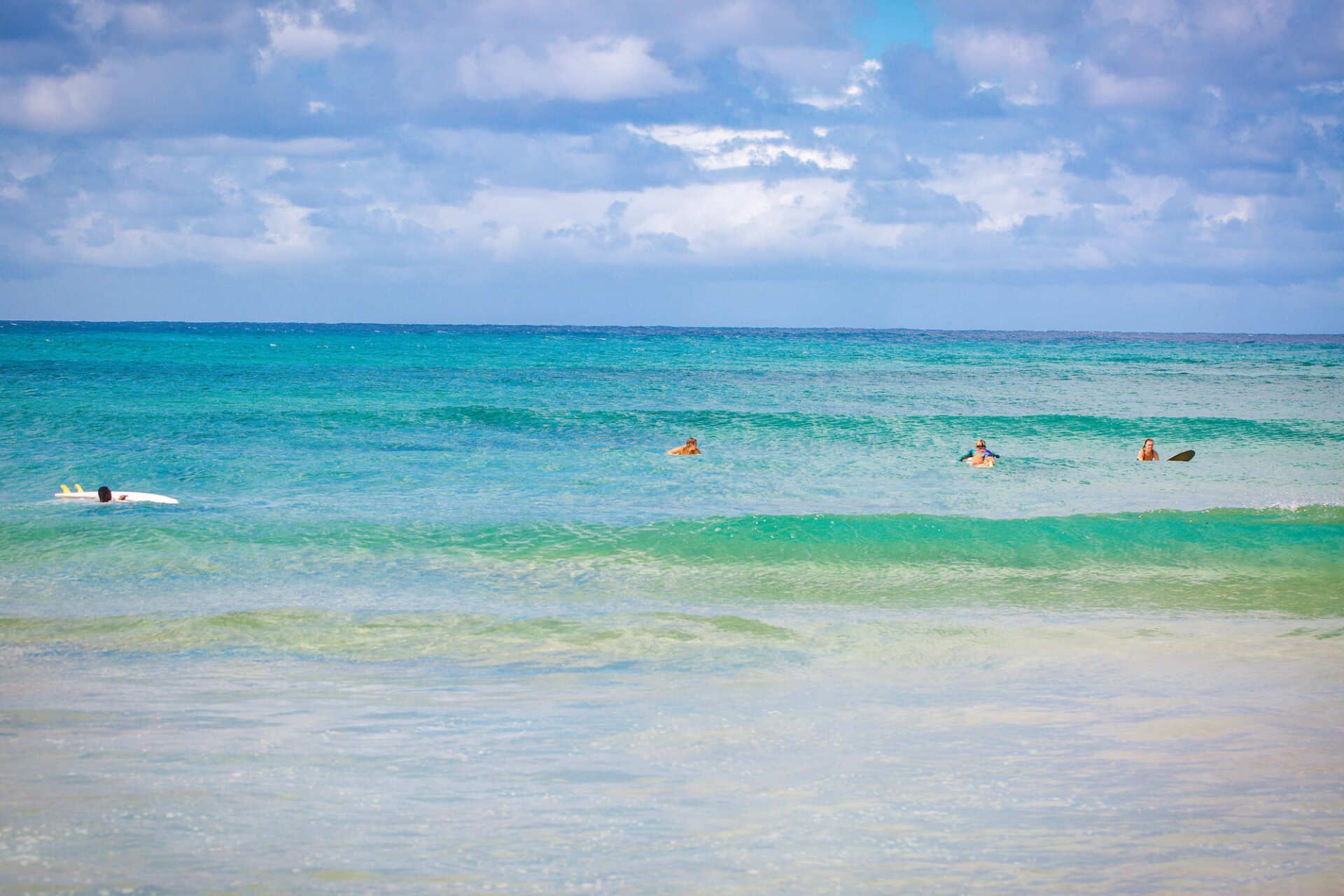 People surfing on Tofo Beach