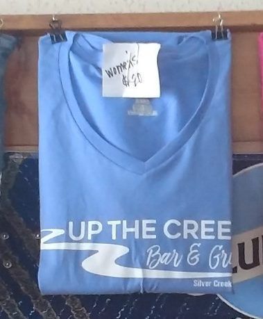 A blue t-shirt with the words 