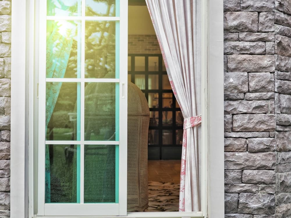 White Aluminum Sliding Glass Window — Glass & Aluminium Services in Emerald, QLD