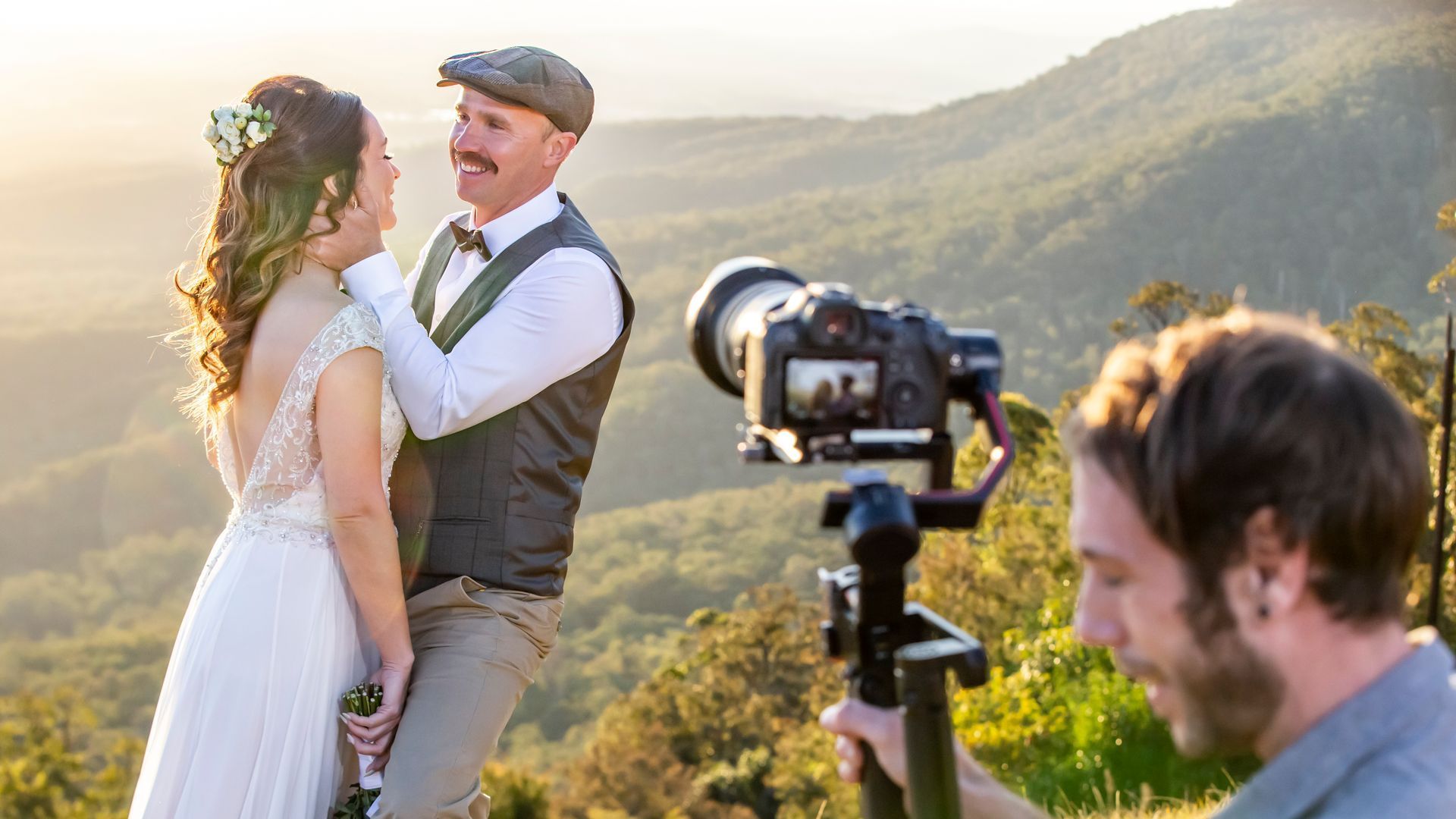 a videographer is capturing a bride and groom on Tamborine Mountain
