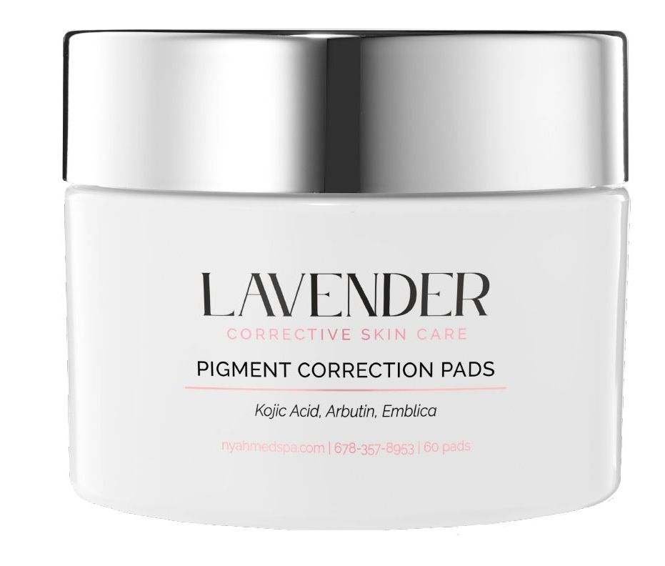 A white jar of lavender corrective skin care pigment correction pads.