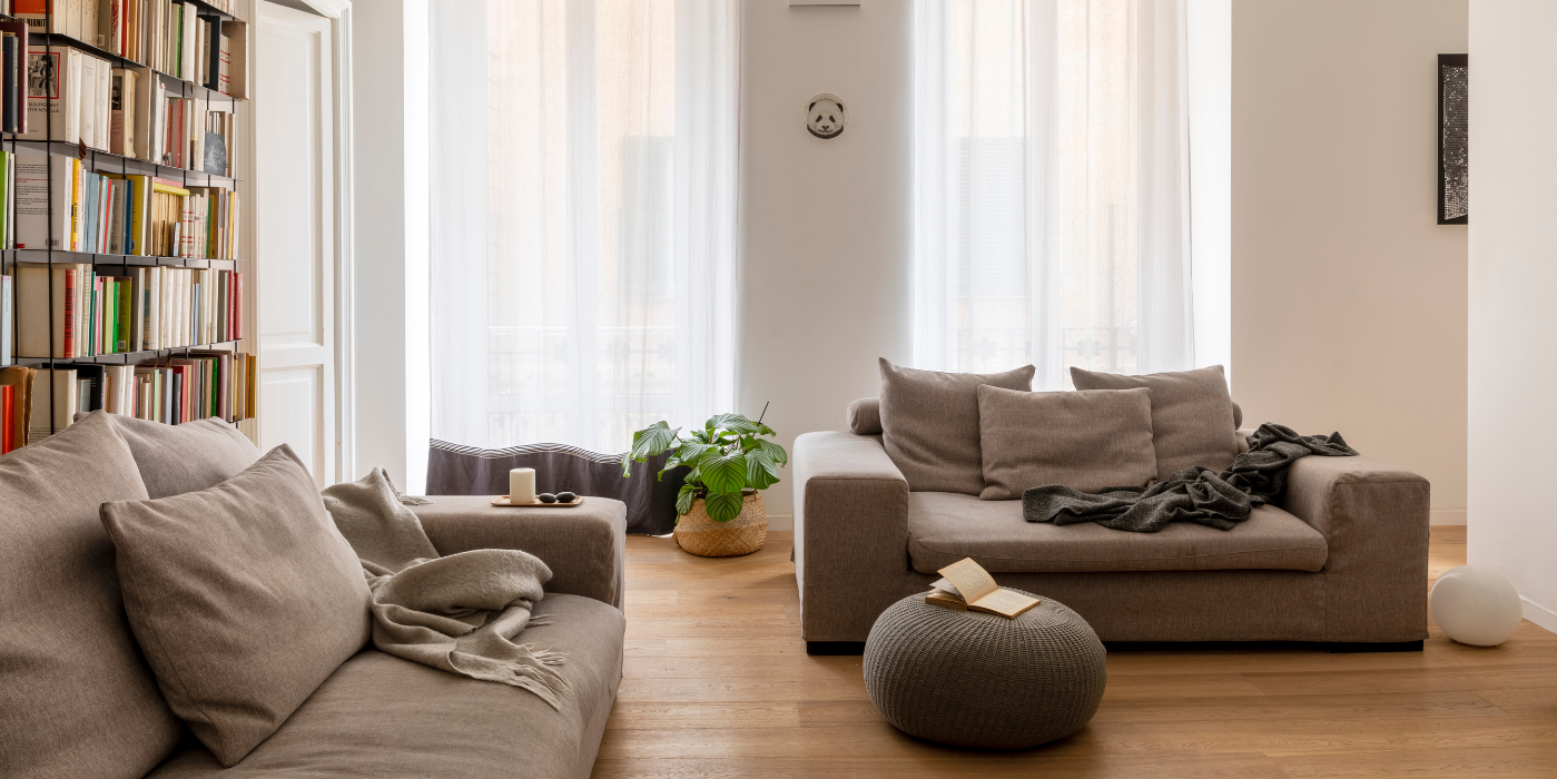A bunch of white pipes are connected to each other in a room.