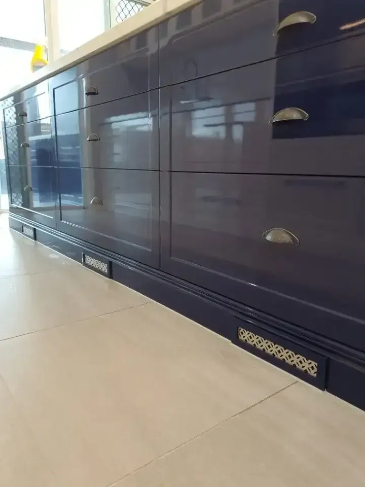 A Kitchen with A Lot of Blue Cabinets and Drawers — JWB Joinery in Aitkenvale, QLD