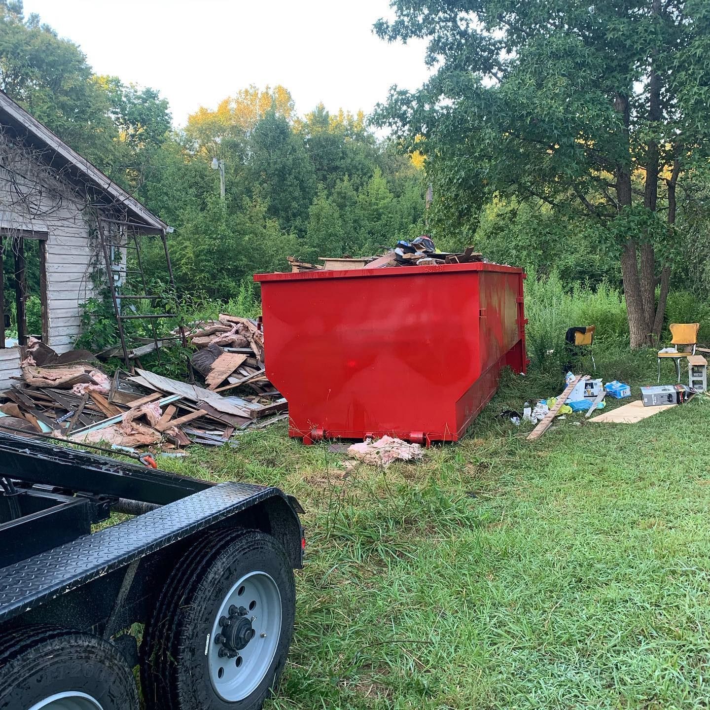 A large dumpster rental from Big Lick Dumpster Rentals at a house clean-out in Albemarle, NC.

