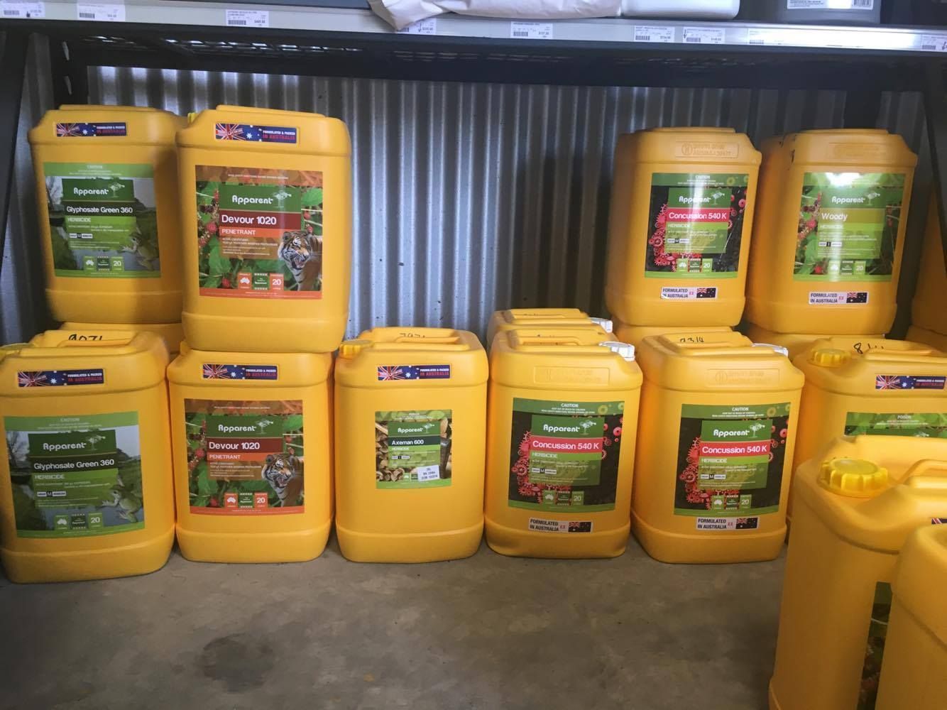 A bunch of yellow containers are stacked on top of each other