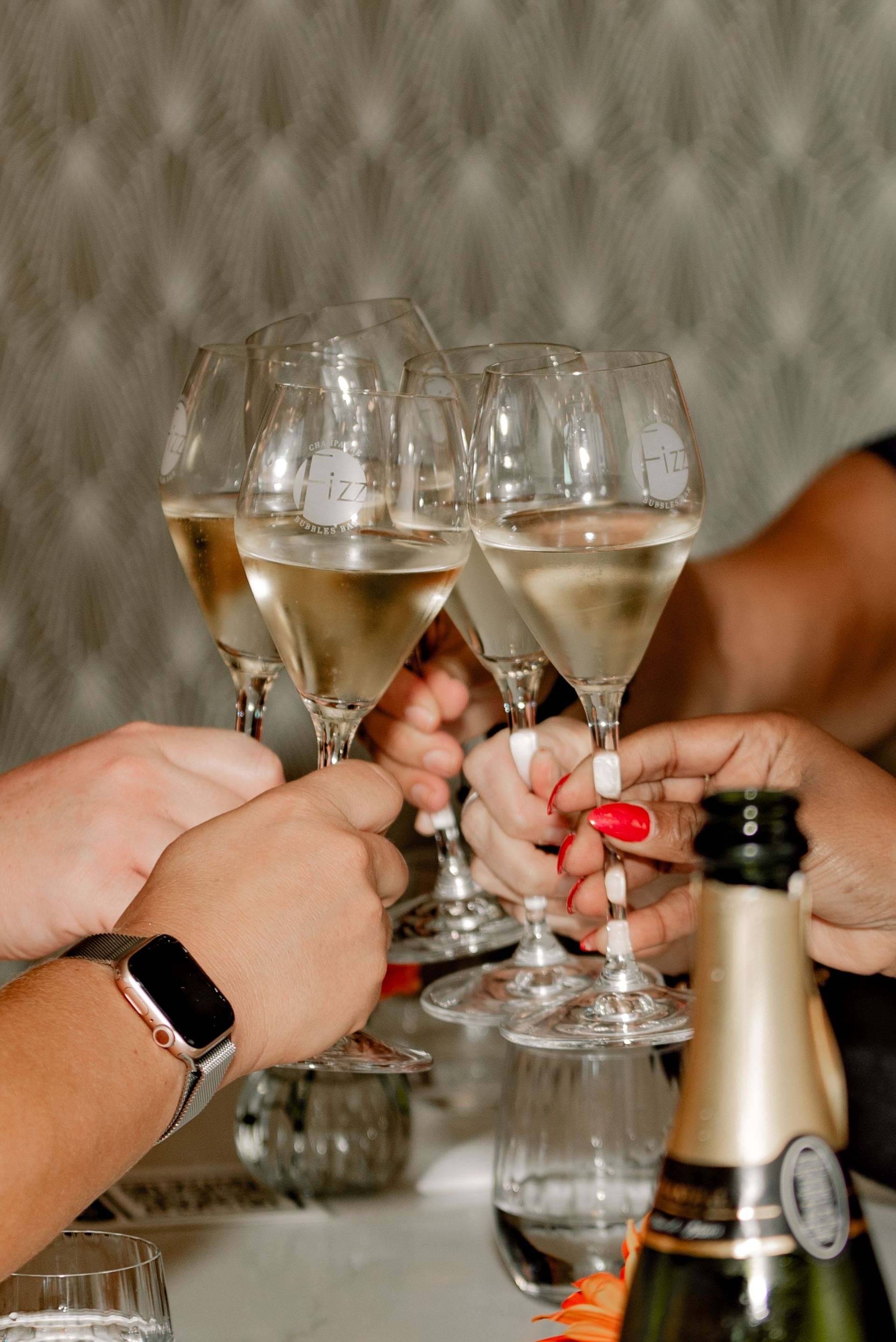 Champagne cheers Fizz Champagne Club.