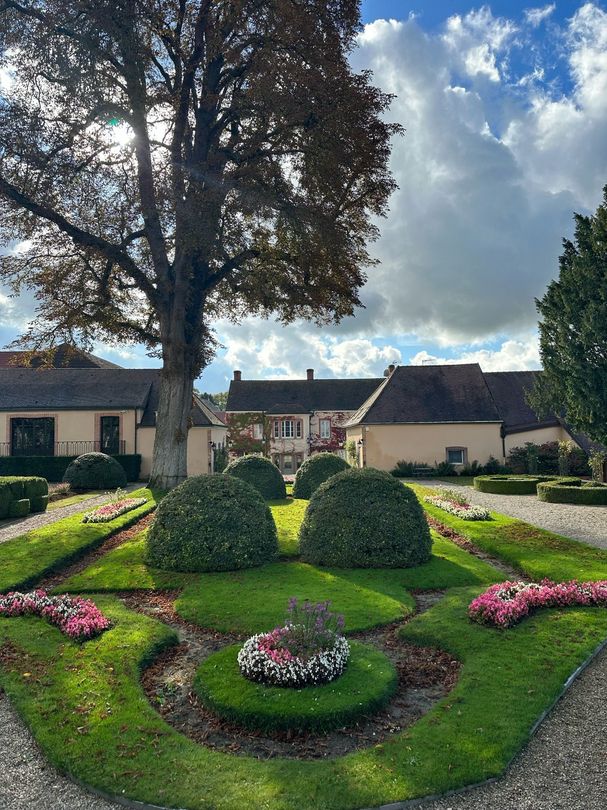 A village and garden in Champagne, France.