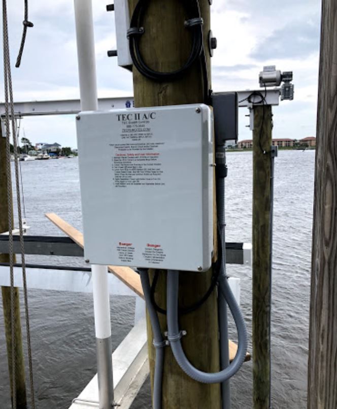 A box on a pole that says technac on it