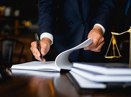 Lawyer Working In Office — Auburn, NY — Norman J. Chirco Law