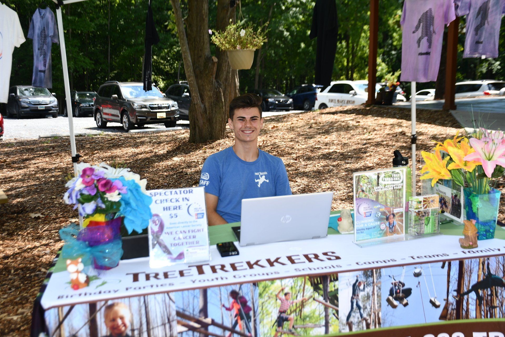 Tree Trekkers staff at Marketing table during Climbing for a Cause Event.