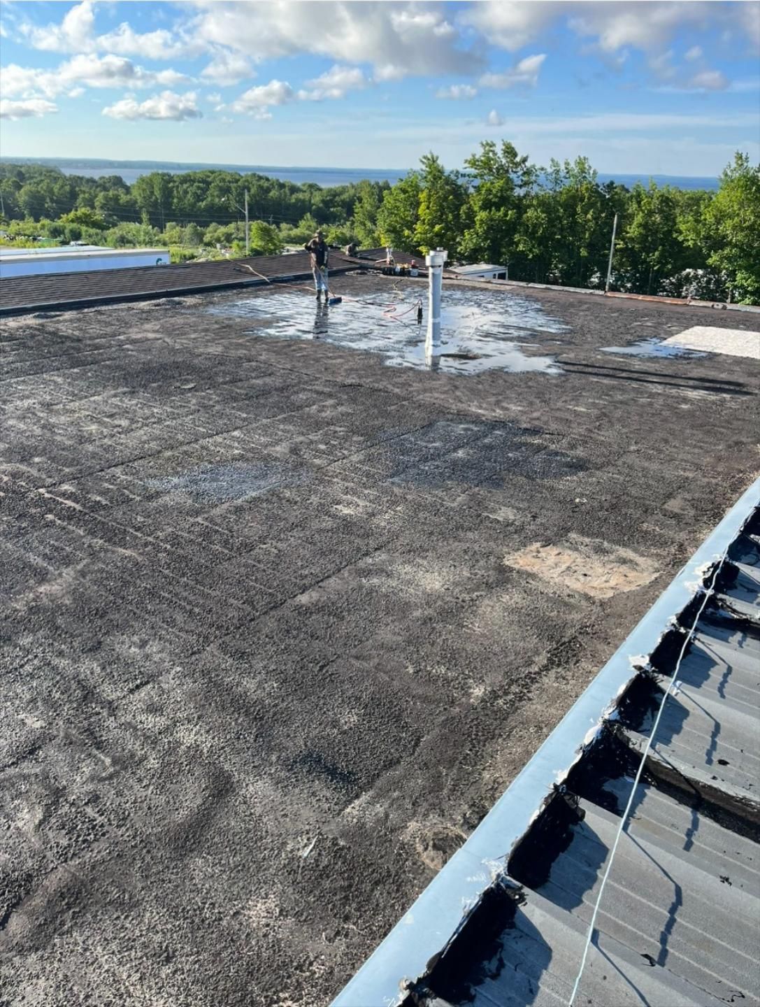 The roof of a building with a view of the ocean