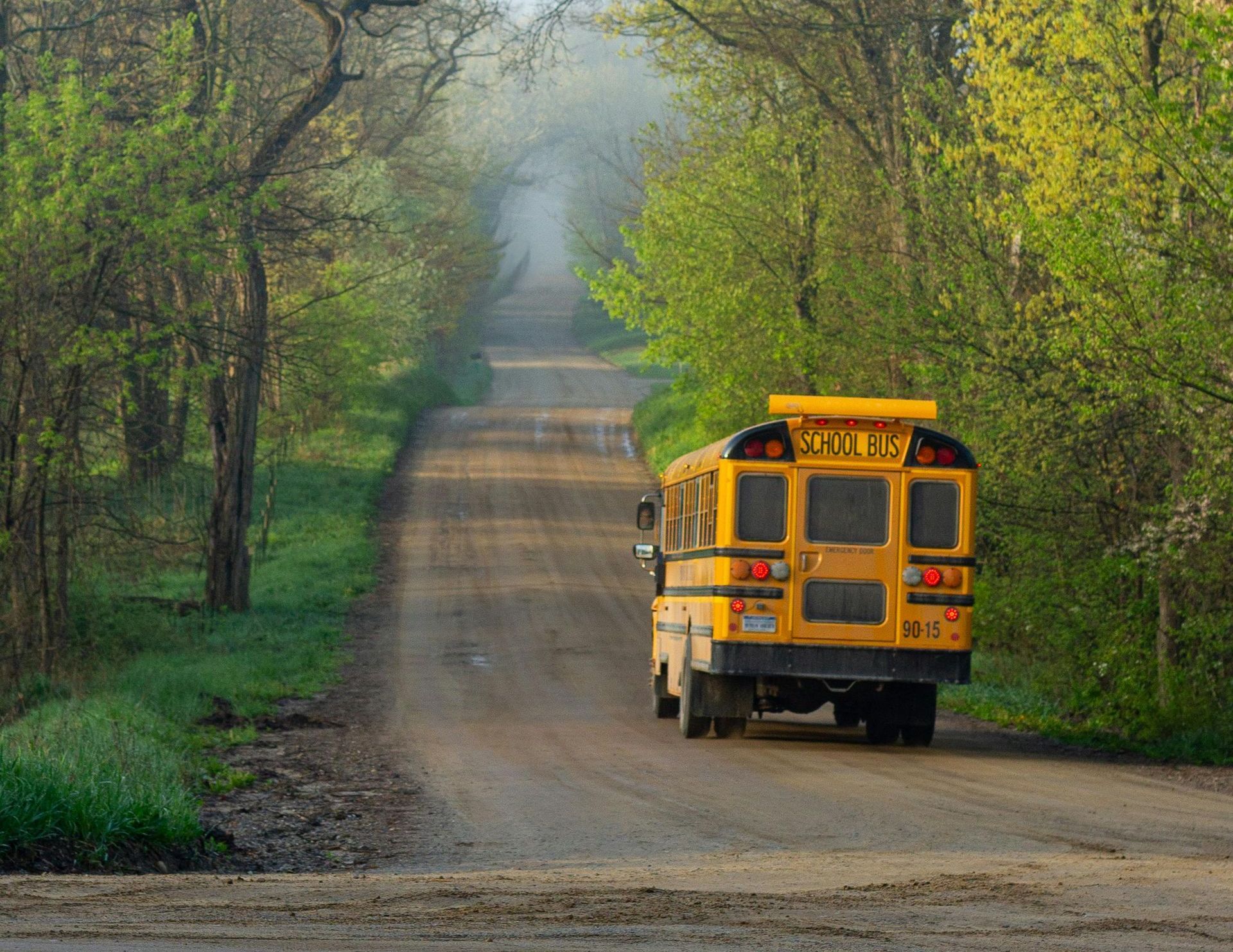 School bus driving on road - ABA Therapy