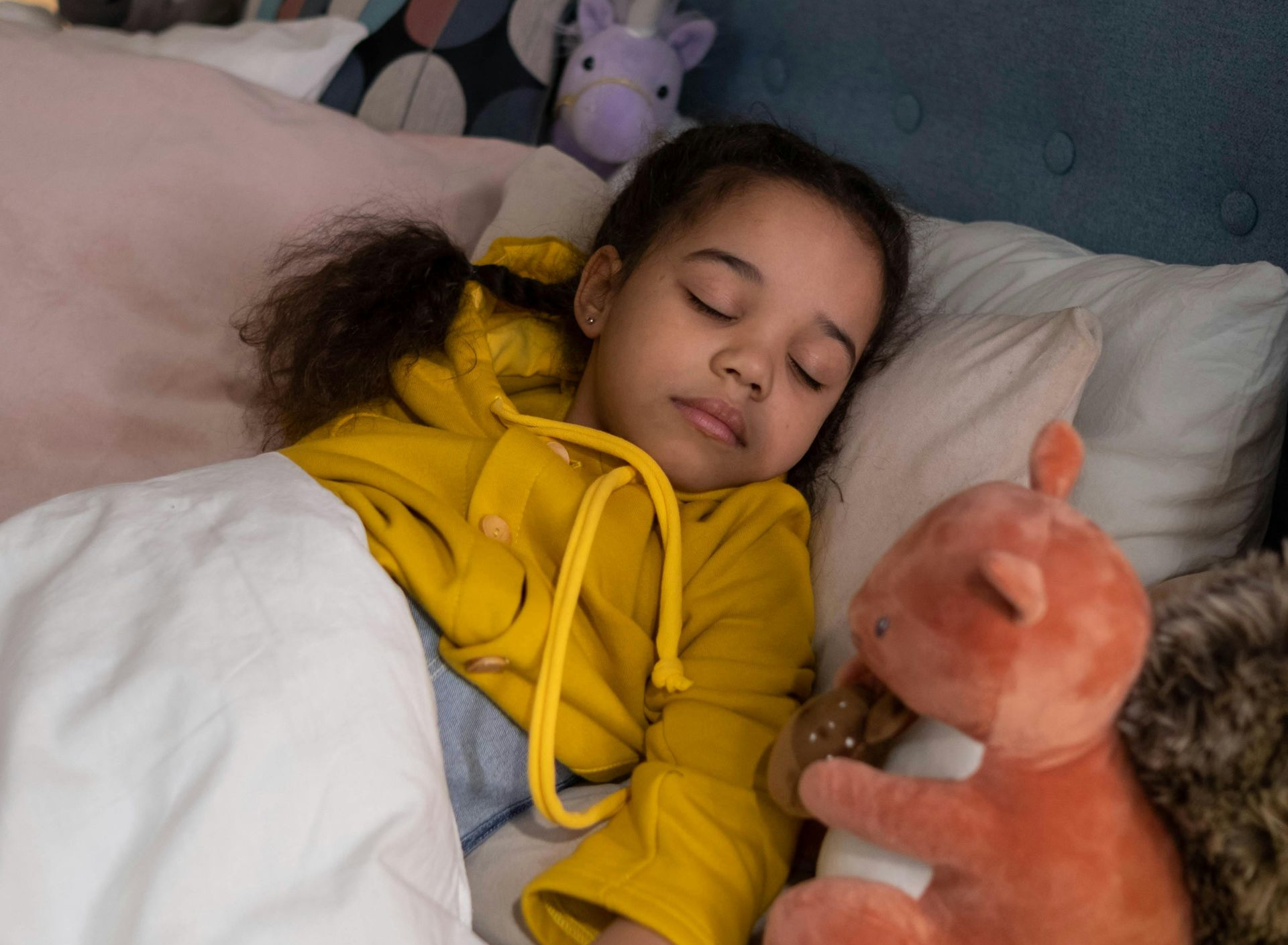 Child sleeping in bed - ABA therapy for autism