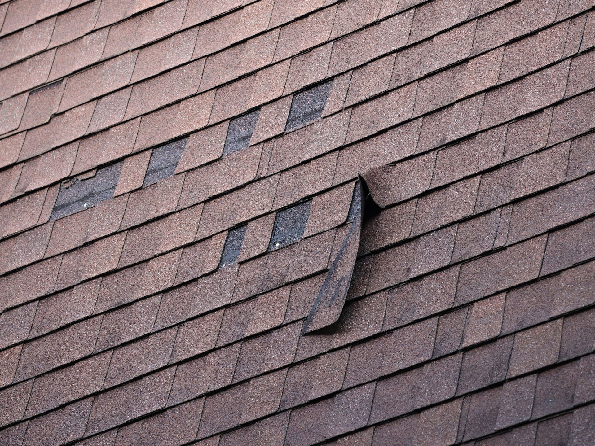A close up of a roof with a hole in it.