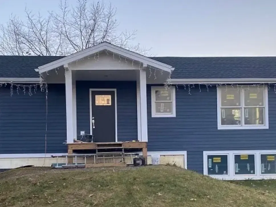 A Blue House With A Porch — Rhinebeck Painters & Carpenters LLC