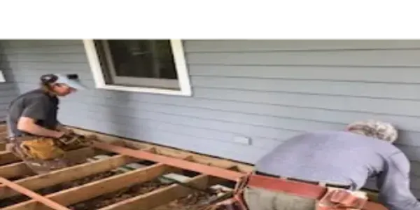 Two Men Working On The Side Of A House — Rhinebeck Painters & Carpenters LLC