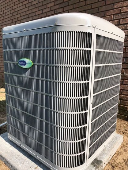 A close up of a Carrier heat pump.
