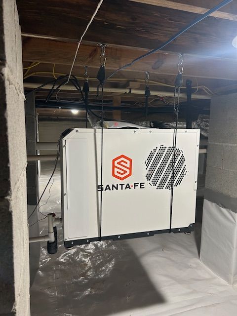 Fully installed dehumidifier to control moisture in encapsulated crawlsapce