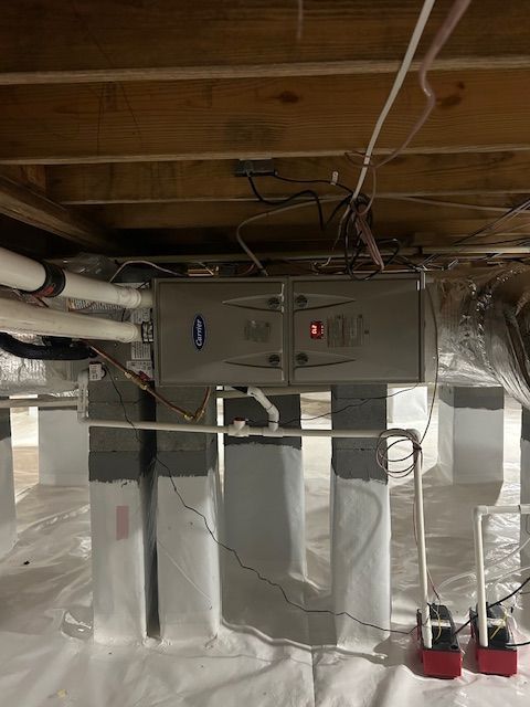 High efficiency Carrier furnace, installed with condensate pumps to remove water