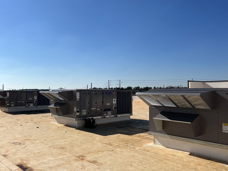 Commercial HVAC units on a building.